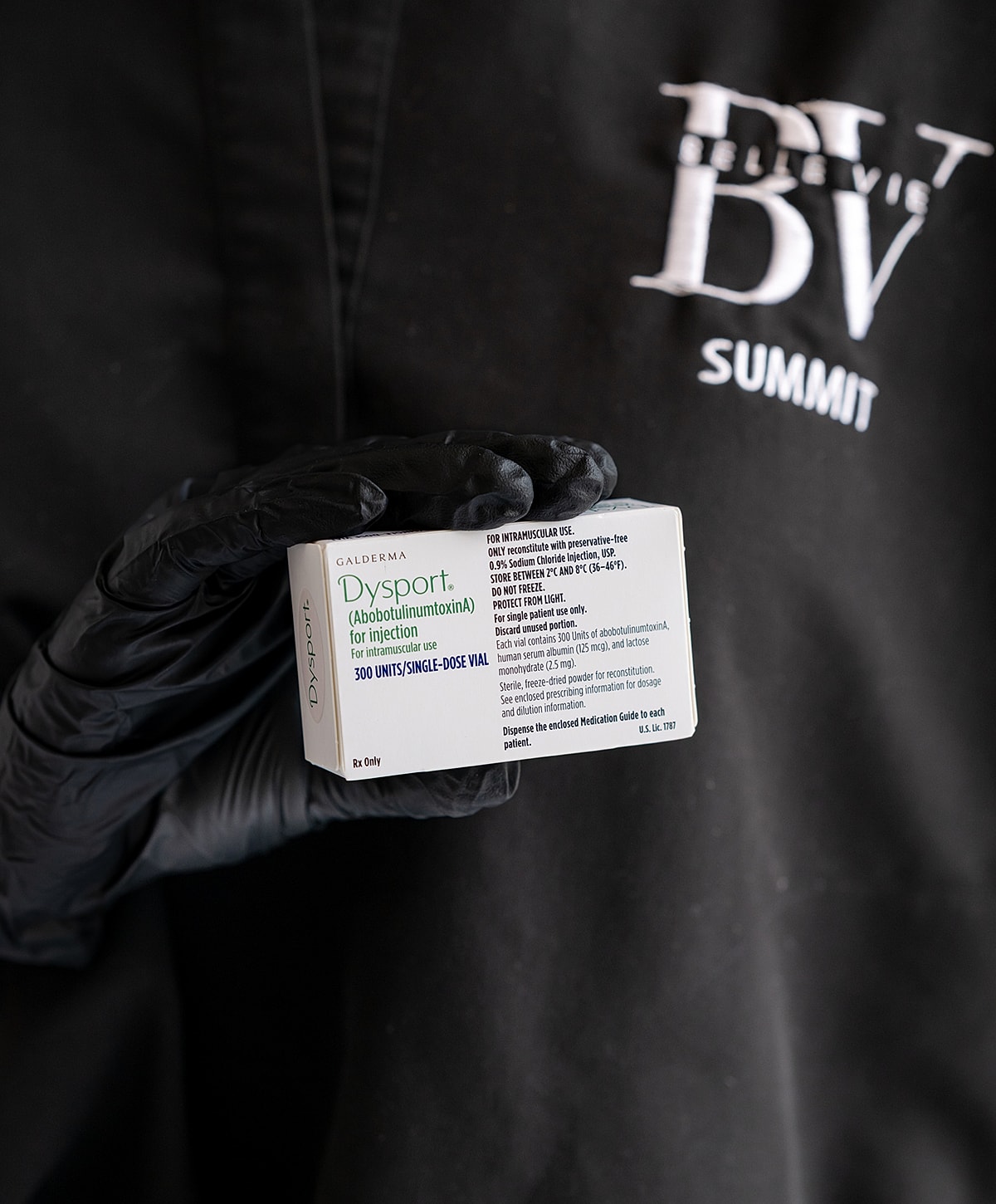 Dysport injection packaging held by gloved hand