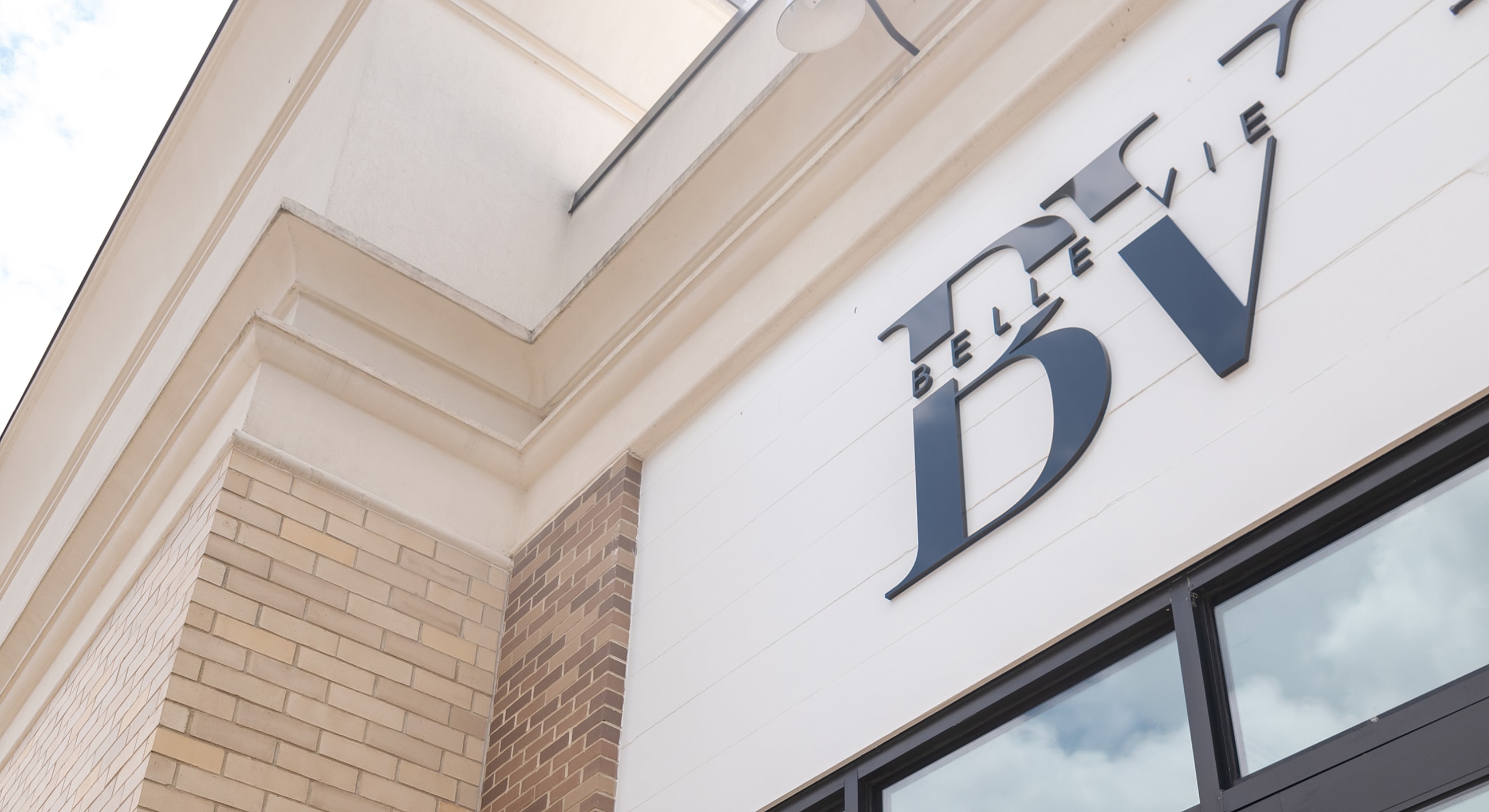 Building corner with stylish signage and architecture